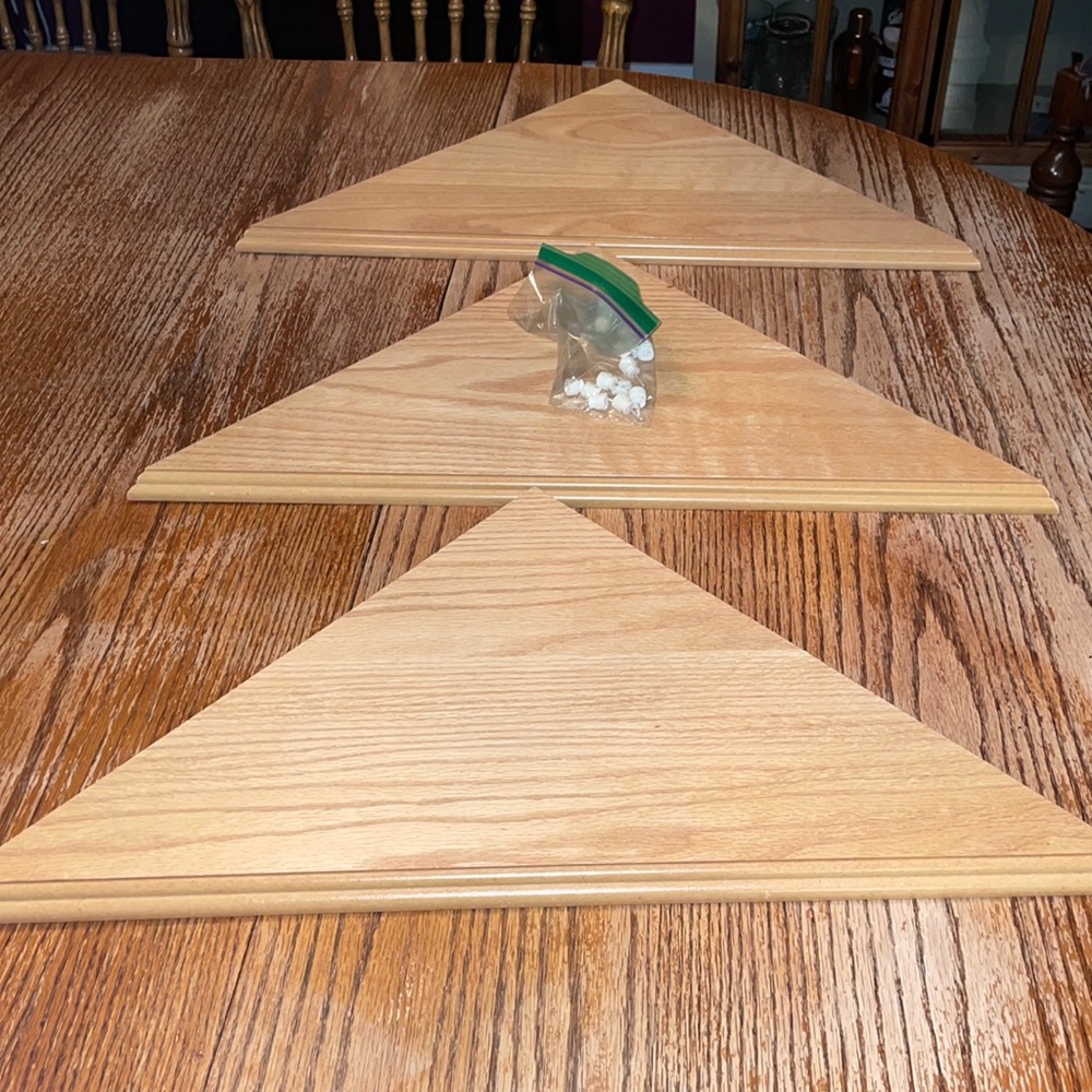 Set of four corner mount floating wall shelves